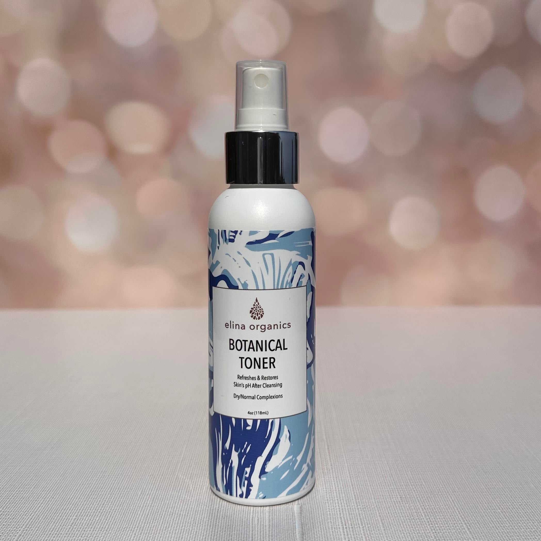 Elina Organics Botanical Toner in front of a Sparkling Background