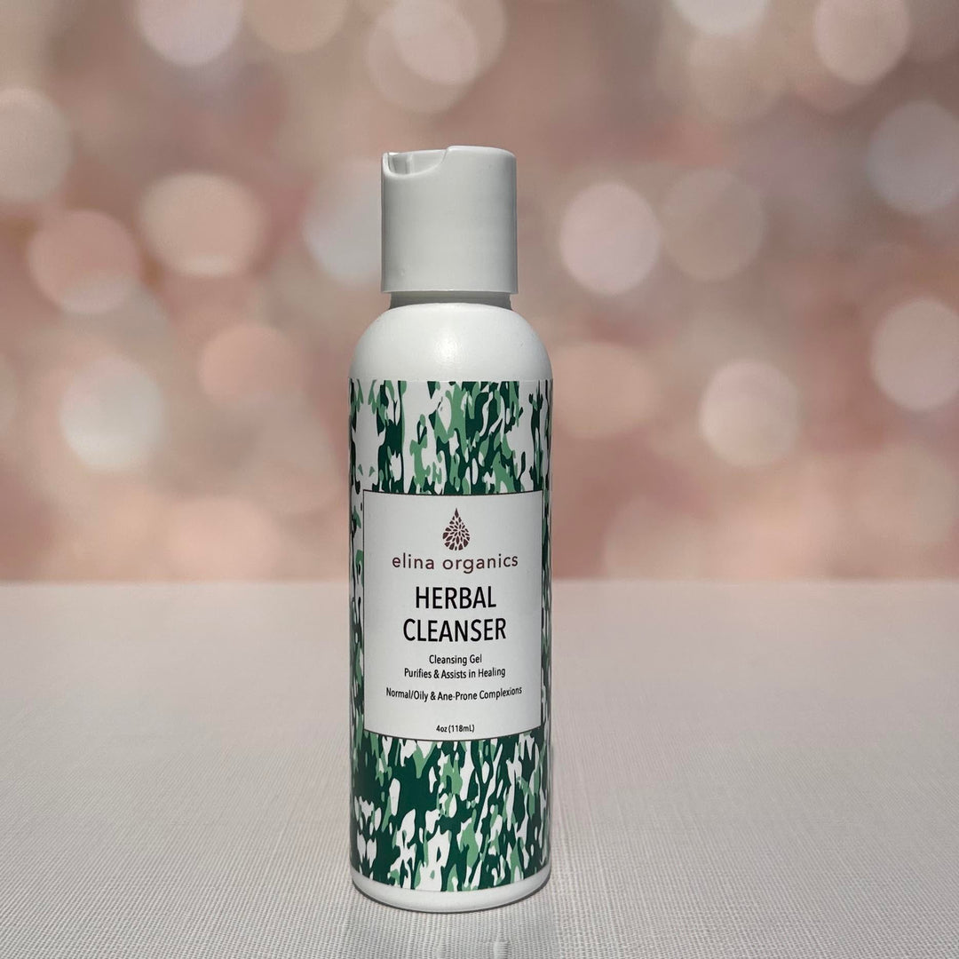 Elina Organics Herbal Cleanser in front of sparkling background