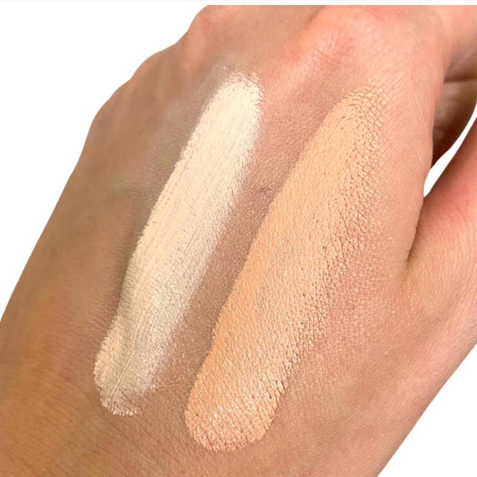 Probiotic Concealer and Highlighter being displayed on hand in both light and medium shades.